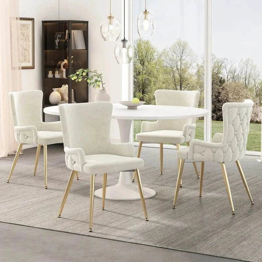 Set of 2 beige velvet chairs with gold metal legs in modern living room setting