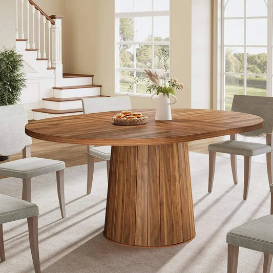 Oval wooden dining table for 6 with central cylindrical base in rustic farmhouse style